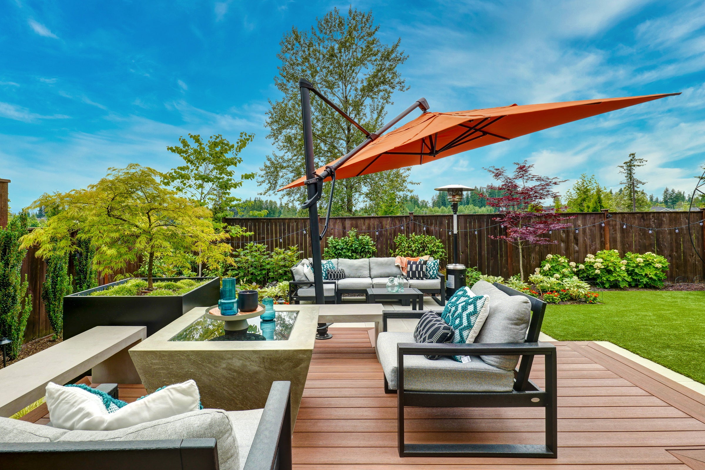 Looking Out Deck Firepit Umbrella Sofa
